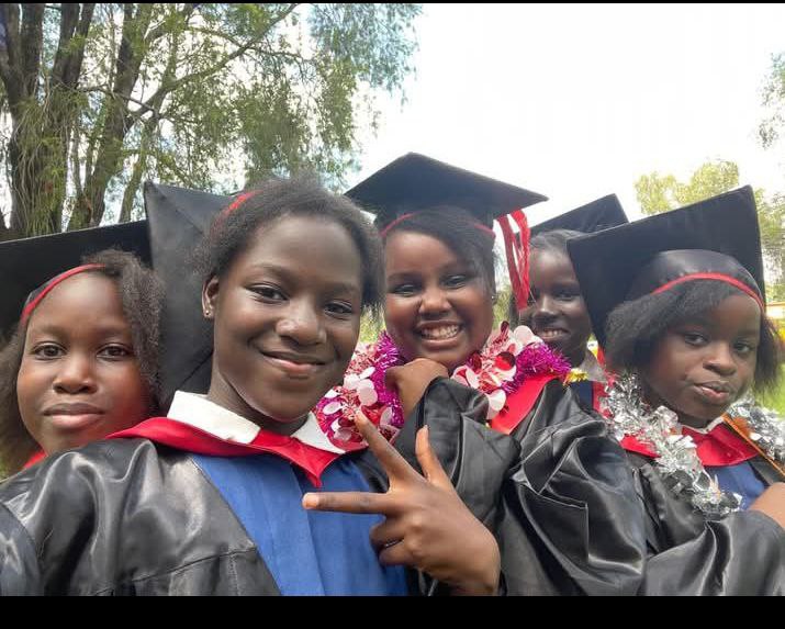 Graduating class in caps and gowns